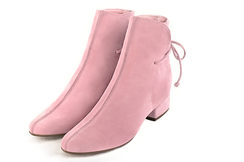 Carnation pink women's ankle boots with laces at the back. Round toe. Low block heels. Front view - Florence KOOIJMAN
